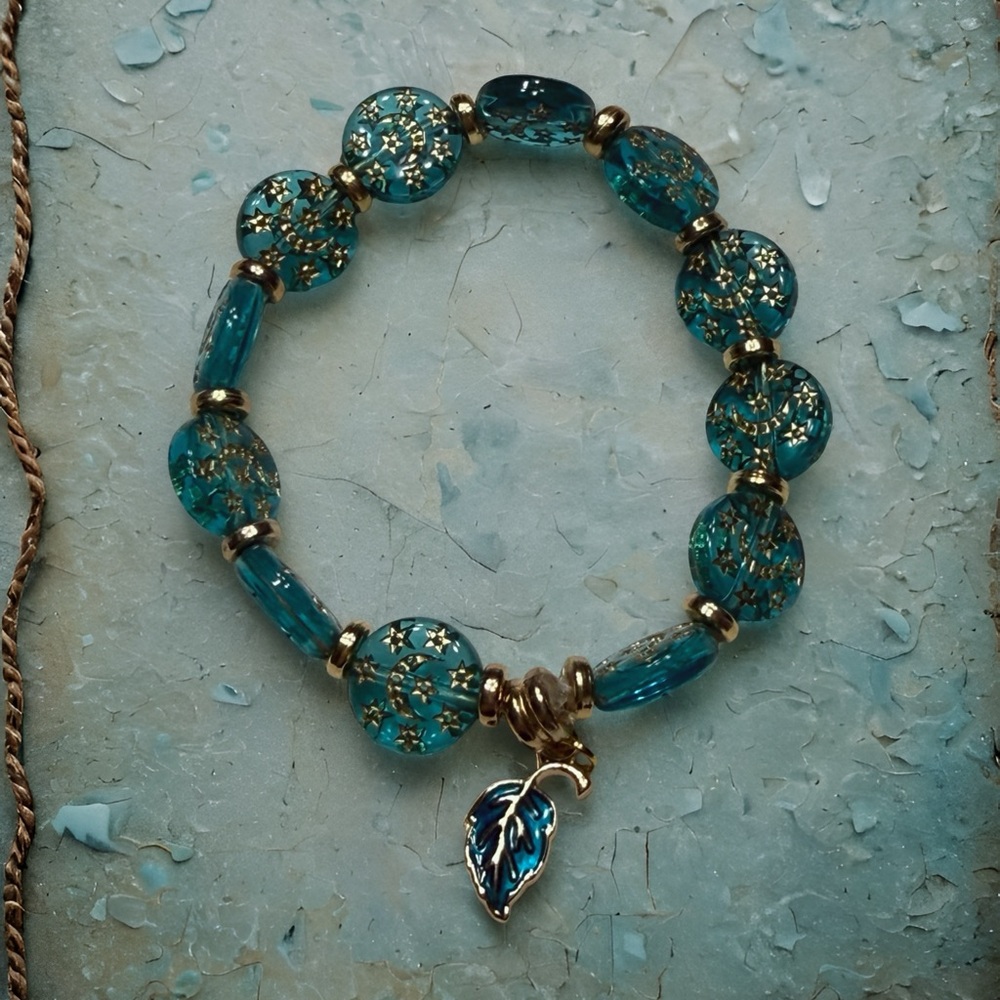 Hand Crafted Teal Acrylic Bead Bracelet with Gold Accents and Leaf Charm - Picture 2 of 5